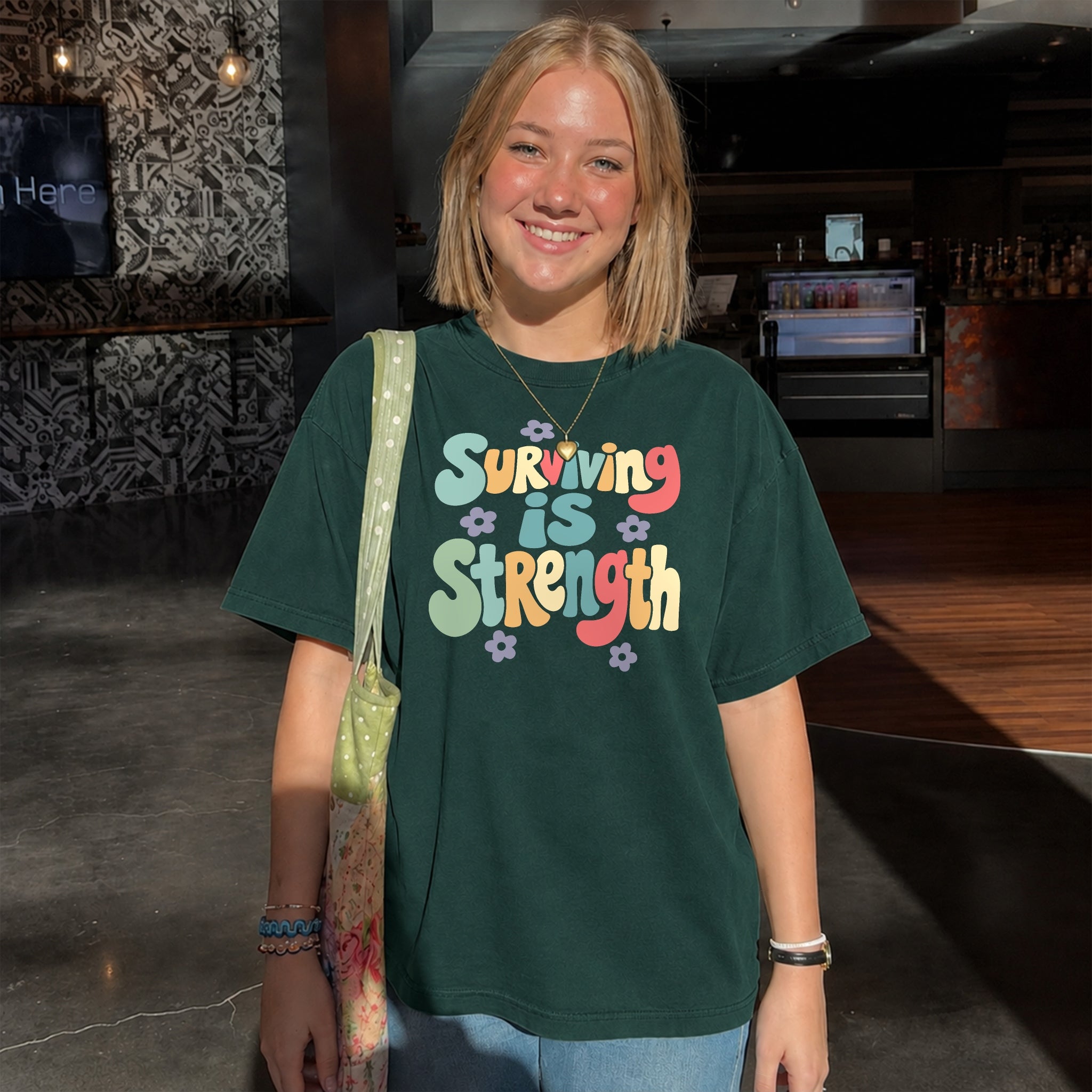Surviving Is Strength Tee - Forest Green front