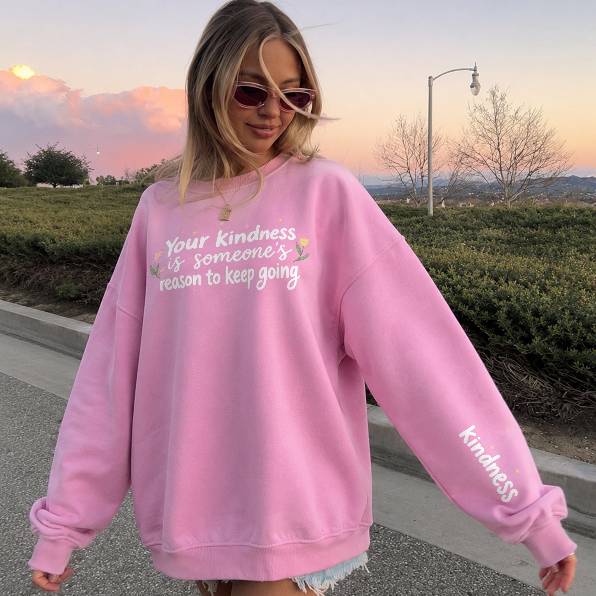Kindness Keeps Someone Going Sweater - Bubblegum front