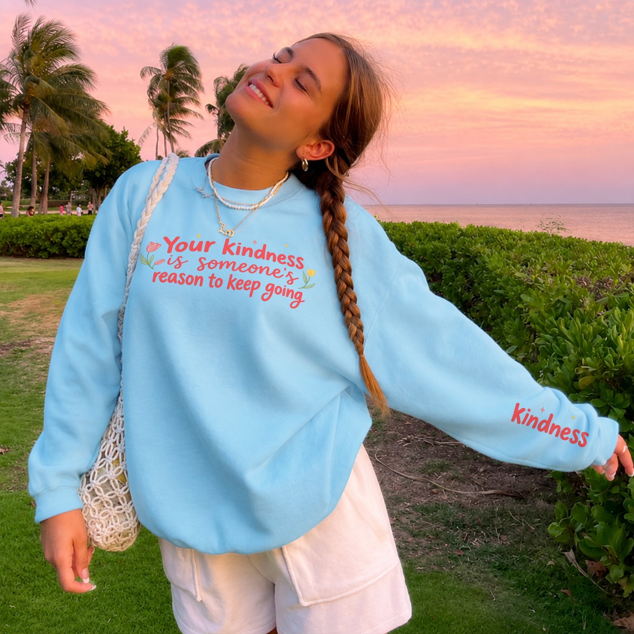 Kindness Keeps Someone Going Sweater - Sky Blue front