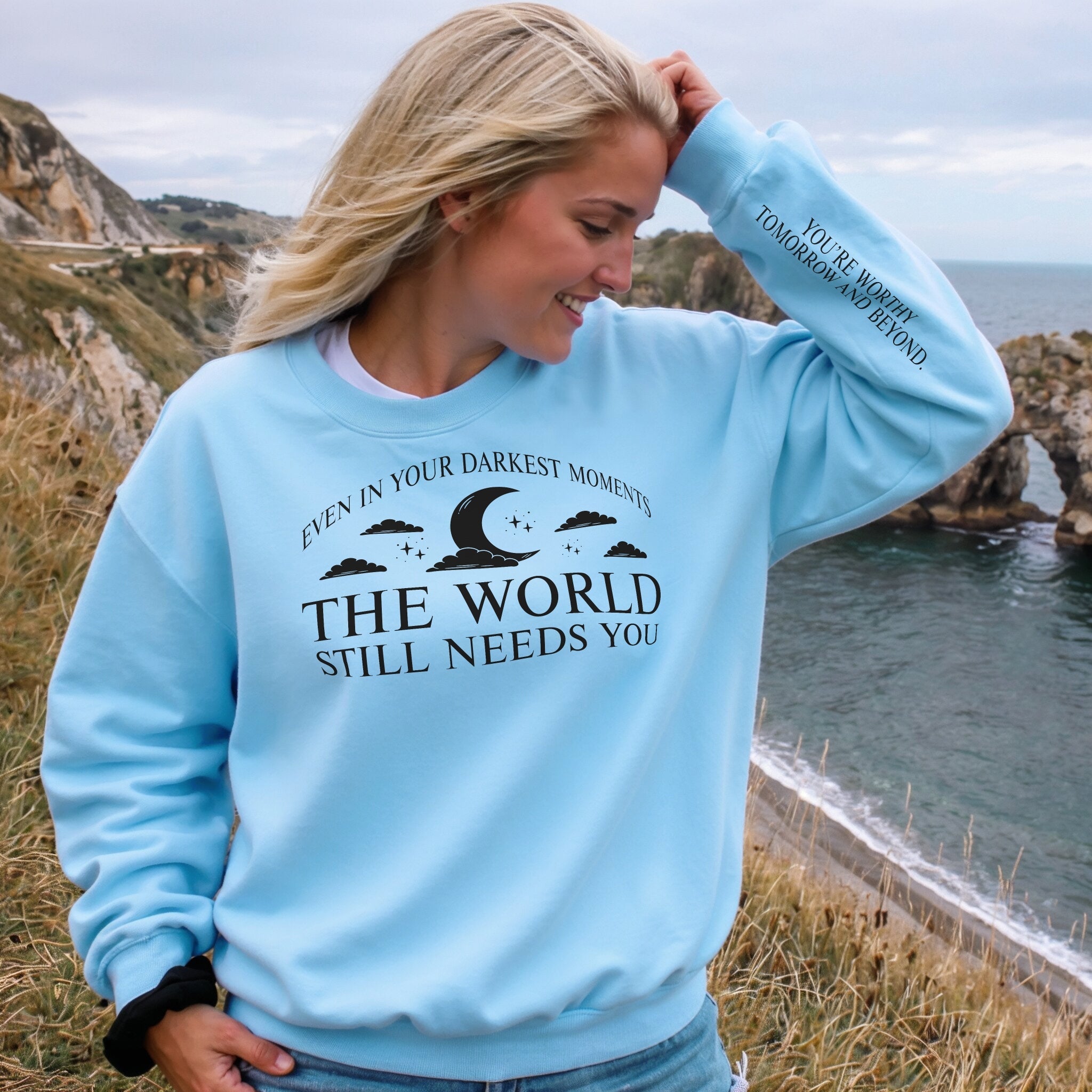 The World Still Needs You Sweater